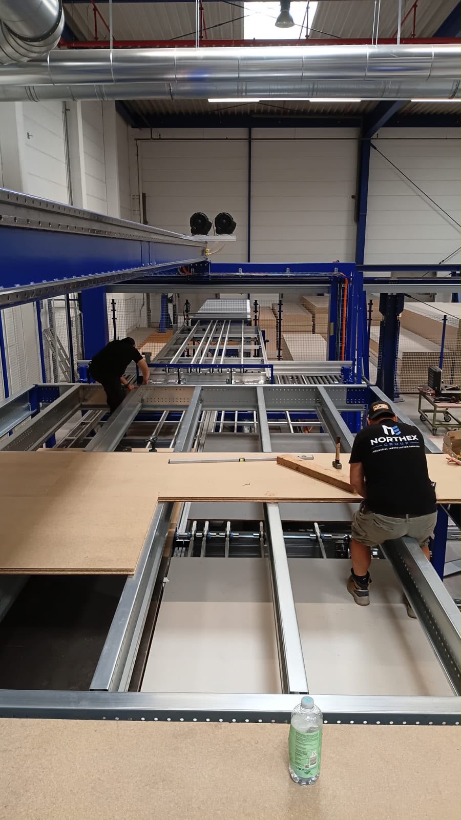 Northex installers laying the mezzanine floor decking — Ballerina-Küchen, Rödinghausen
