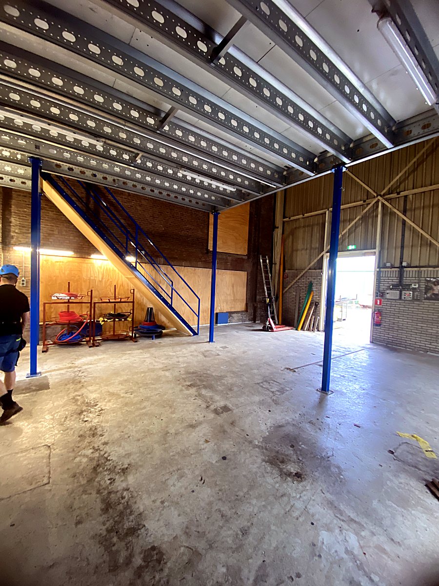 Steel mezzanine support structure with access staircase — Royal IHC B.V., Kinderdijk